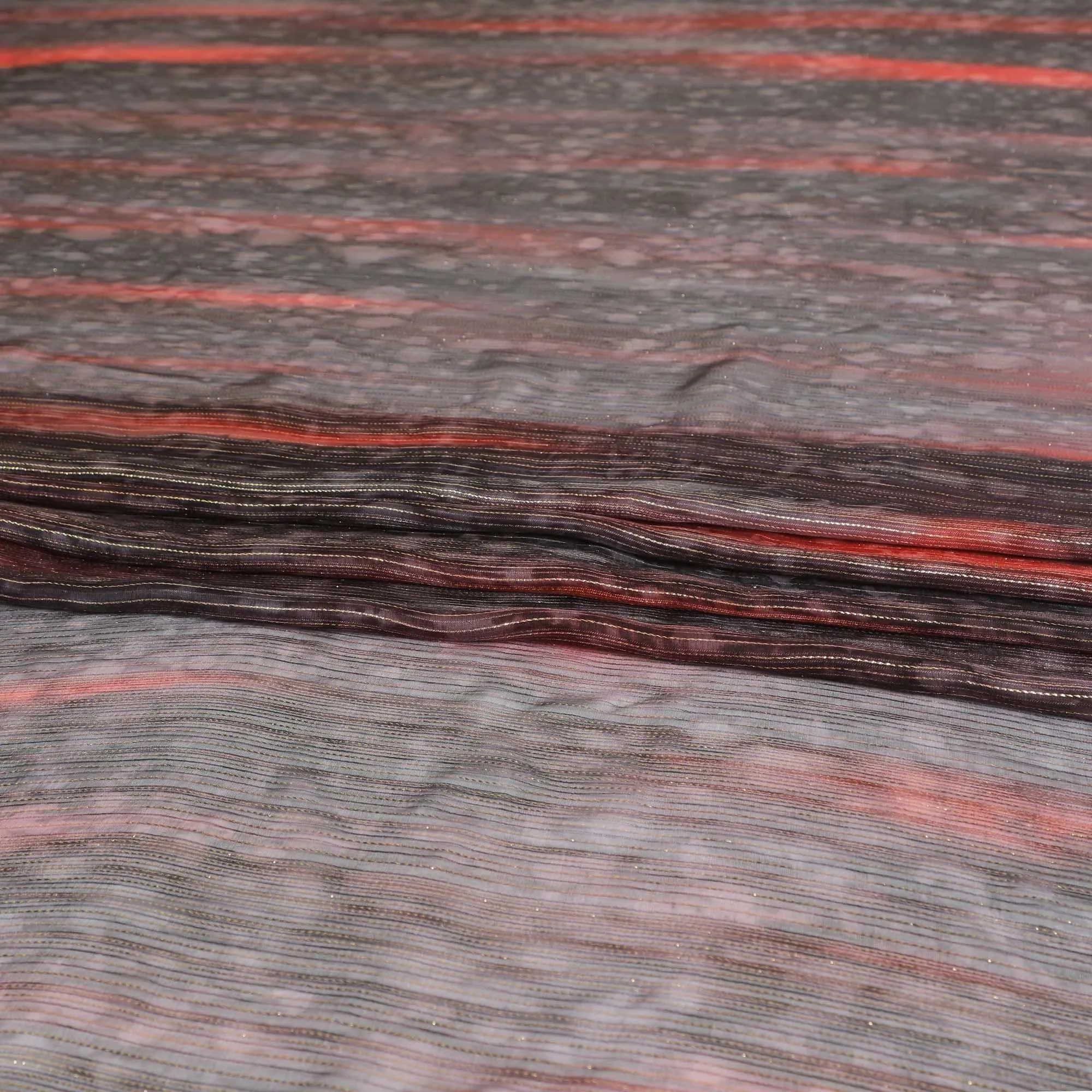 Black pure silk chiffon fabric with brick red print having gold metallic lurex in stripe design-D8974