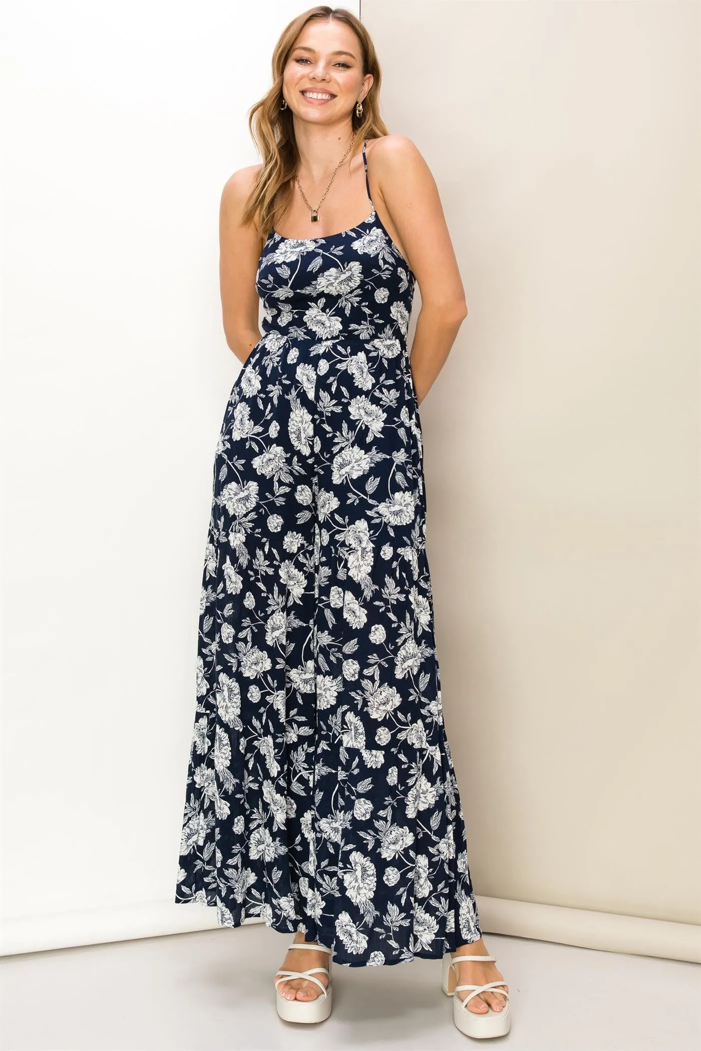 FLORAL-PRINT SLEEVELESS JUMPSUIT