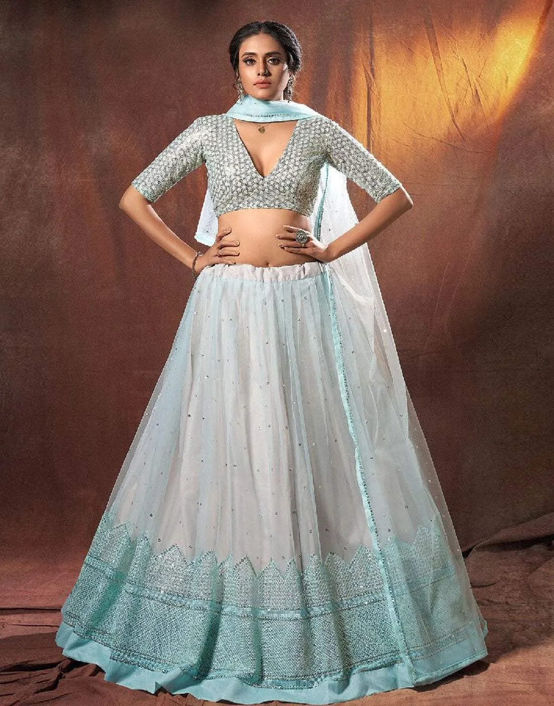 Lehenga Choli in Soft Net Fabrics with Resham Work and Grey Color